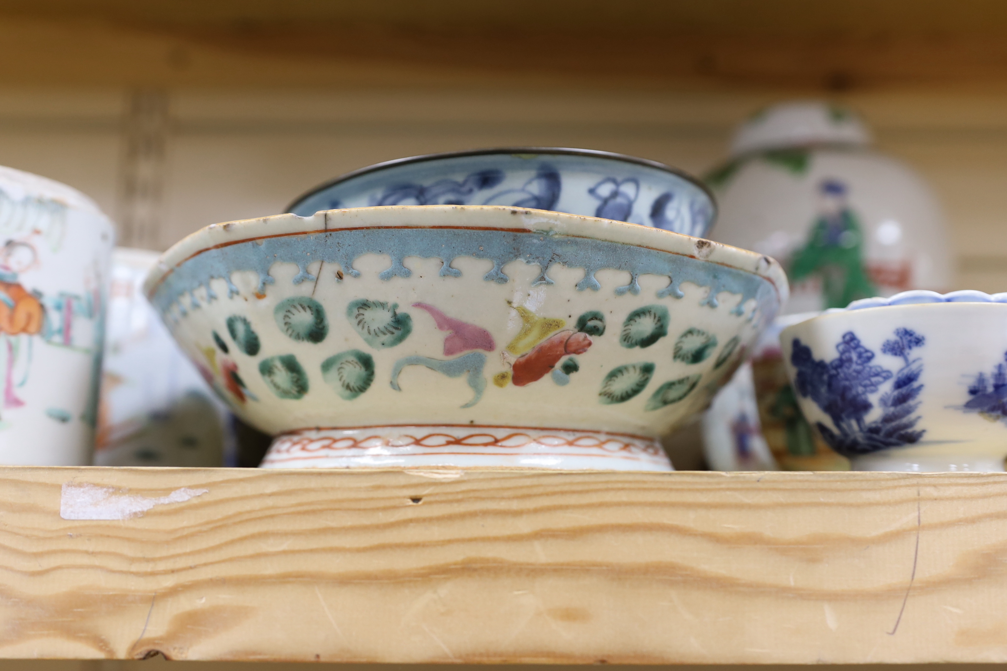 A group of Chinese blue and white and enamelled porcelain jars, plates and bowls, 18th century and later, largest 26cm high